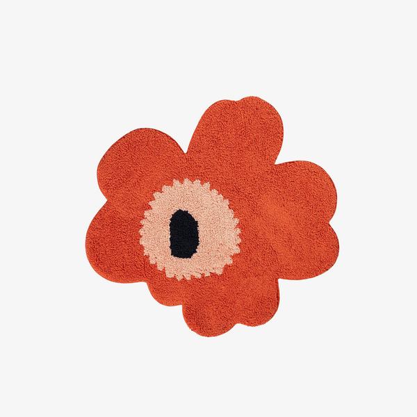 Floral-shaped rug with a red flower on a white background
