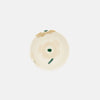 Round beige object with a green accent on a white background