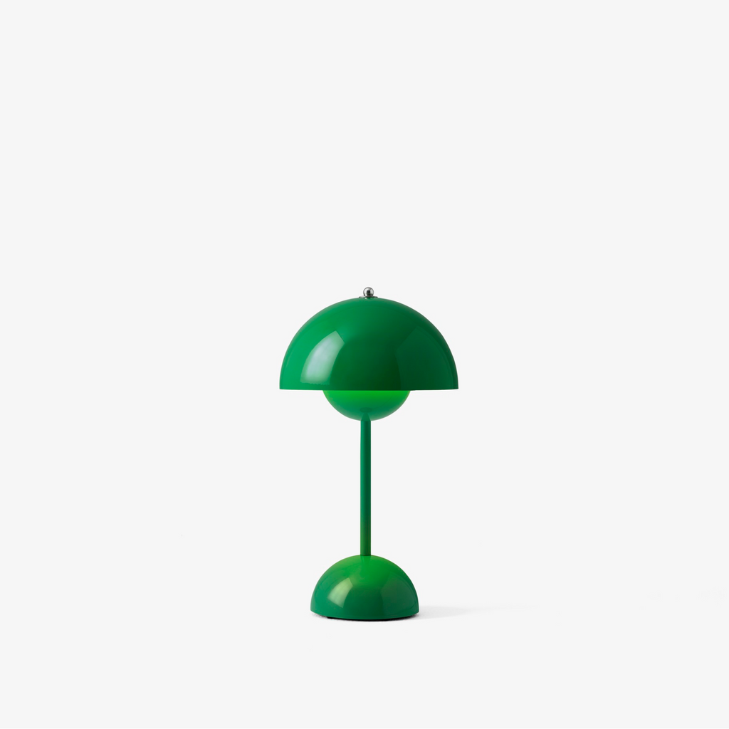 Green table lamp on a white background