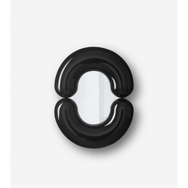 Black plastic clip on a white background